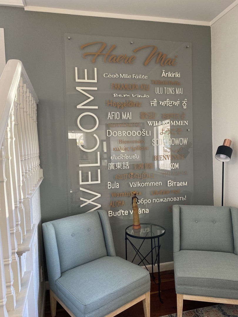 multiple language welcome sign on acrylic wall sign
